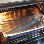 Pečenje u rerni i dodavanje krompira | Postupak 5 | Slika 1/6 Krmenadle u sosu od crnog luka | Pečenje u rerni i dodavanje krompira | Postupak 5 | Slika 1/6