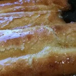 Pita sa grizom i limunom | Dodavanje preliva | Postupak 5 | Slika 3/4